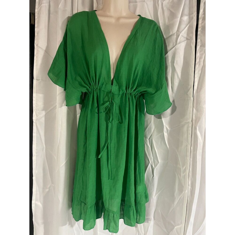 Image Green tunic dress size ?  medium